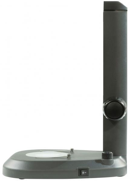 It is a gray screen reader or magnifier with a flat base. There are controls for magnification and a switch on a vertical stand.