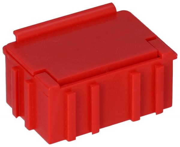 Es handelt sich um eine kleine, rechteckige Box in leuchtendem Rot. Die Box hat eine flache Oberseite und ist an den Seiten mit vertikalen Rillen versehen. Sie wirkt robust und stabil.