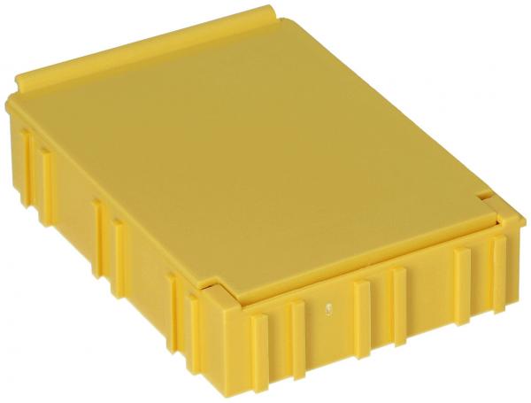 Das Bild zeigt eine gelbe, rechteckige Box mit einer flachen Oberseite. Die Box hat feste Wände mit groben, vertikalen Rillen und ist aus einem robusten Material gefertigt.