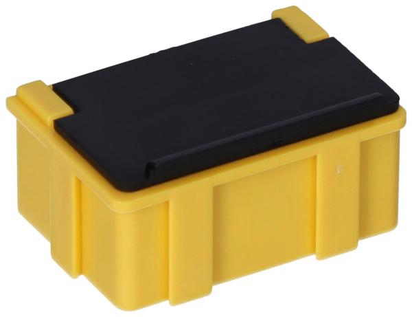Es handelt sich um eine rechteckige Box mit einer gelben Unterseite und einem schwarzen Deckel. Die Ecken sind abgerundet, und die Box hat seitliche Griffvertiefungen.