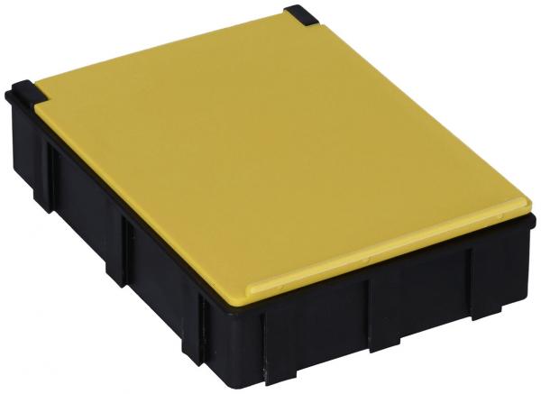 Das Bild zeigt eine rechteckige, kugelsichere Box. Sie hat eine schwarze Basis und einen flachen, gelben Deckel. Die Kanten sind klar definiert, und die Oberfläche ist glatt.