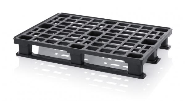 The image shows a black plastic pallet. It has a grid-like structure with several square openings and four sturdy feet on the sides.
