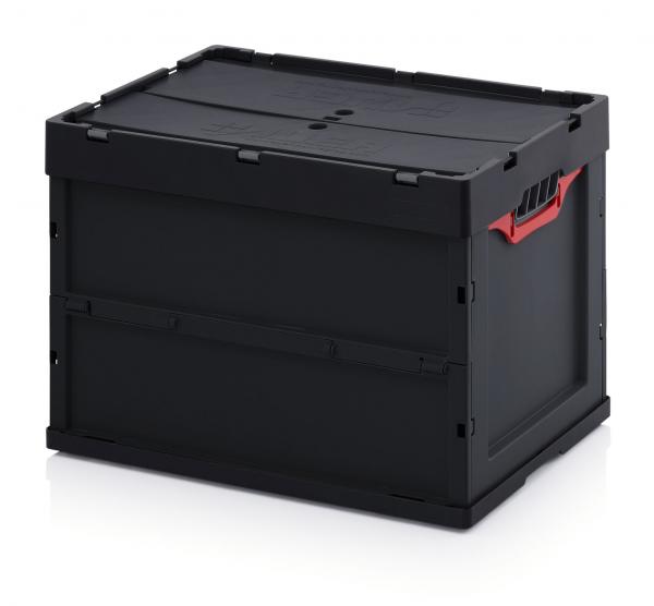 Es ist eine schwarze Kunststoffbox mit einem stabilen, geschlossenen Deckel. An einer Seite sind rote Griffe, die das Tragen erleichtern. Die Box hat eine rechtwinklige Form.