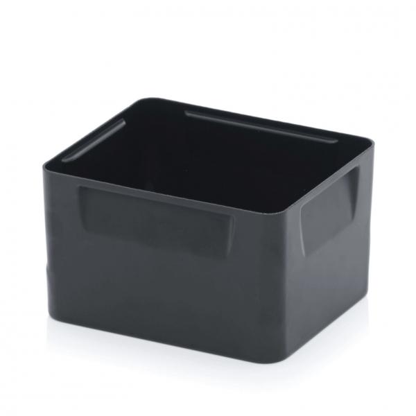The image shows a rectangular container made of black plastic. It has straight edges, a matte finish, and no lid. There are small grip cutouts on the sides.