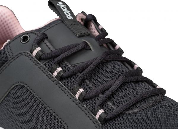 The image shows a black sports shoe with a striped texture. The laces are black, with a delicate pink insole. The shoe has a soft, breathable surface.