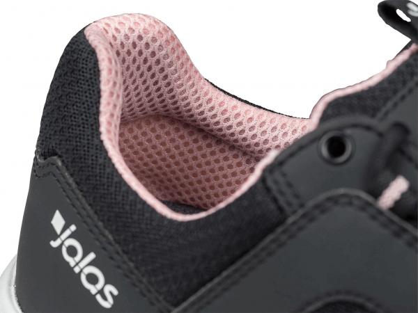 The image displays a shoe shot featuring a black sneaker with a soft, pink lining. The shoe has a special structure for breathability.