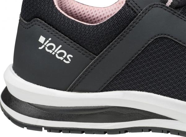 The image shows a sporty shoe in black with a padded, pink lining. The sole is white with a darker, textured underside. A logo is visible on the side.