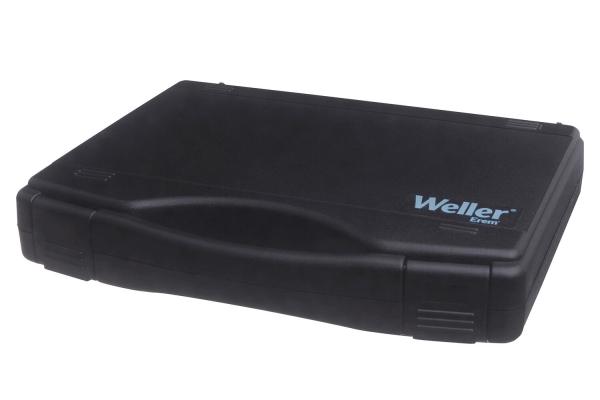 Das Bild zeigt eine schwarze, rechteckige Tragetasche mit abgerundeten Kanten. Sie hat einen Griff und das Logo "Weller" in blauer Schrift an der Seite. Die Oberfläche ist glatt und glänzend.