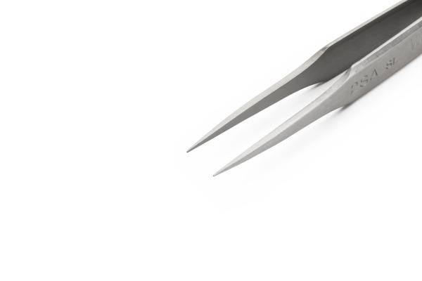 The image shows a narrow, metallic tweezer. The ends are pointed and tapered, with a smooth, shiny surface. The background is white and plain.