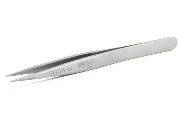 In the image, a silver tweezer is visible. It has two pointed ends and a flat, smooth grip area. The surface is shiny and is likely made of stainless steel.