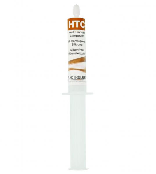 Das Bild zeigt eine Spritze mit einer weißen und orangen Verpackung. Der Aufdruck enthält den Text "HTC" und beschreibt das Produkt als Wärmeleitpaste für Elektronik.