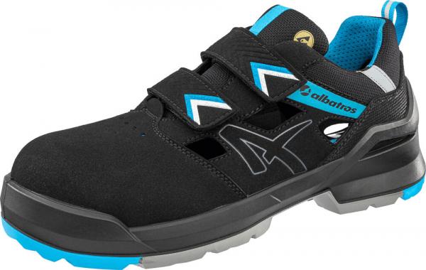 The shoe is black with blue and gray accents. It has two Velcro straps and a sturdy sole. The design is sporty and functional, ideal for active use.