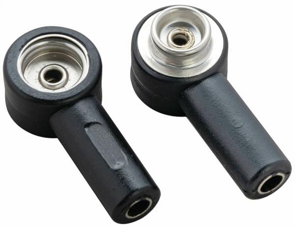 The image shows two black, cylindrical adapters with a round, silver opening at the top and a narrow, straight neck. They appear sturdy and made of plastic.