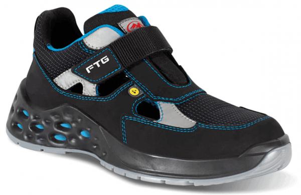 The shoe is black with blue and gray details. It has a wide Velcro strap, breathable inserts, and a textured sole with small holes for good grip.