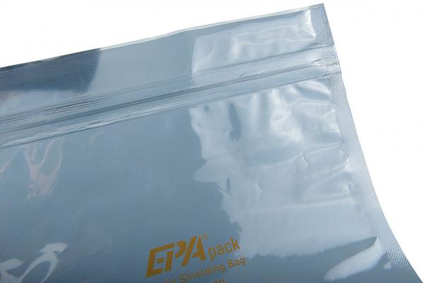 The image shows a transparent, folded plastic bag with a smooth surface and a yellow print. The bag has a zipper on top.