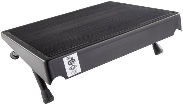 The image shows a rectangular, black platform with a slightly textured surface. It has four legs that are adjustable in height, and a pleasant, modern appearance.