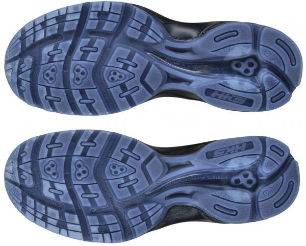 The image displays the sole of a sports shoe. It is black with blue and gray rubber tread elements that provide the shoe with grip and stability. Various cleats and patterns are visible.
