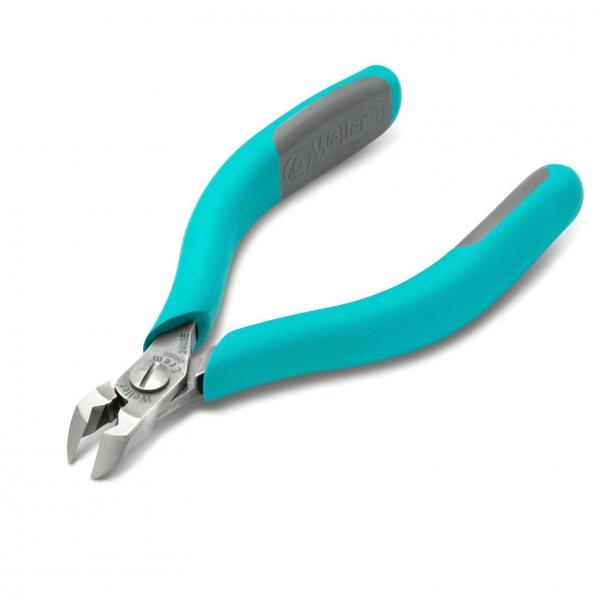 The image shows a pair of pliers with ergonomic, teal-colored handles. The cutting edges are flat and metallic. It is designed for precise tasks and fits comfortably in the hand.
