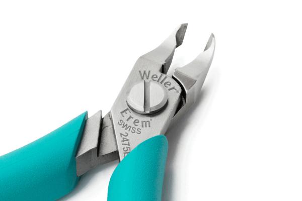 The image shows a silver pair of pliers with sharp edges and a blue handle. There is a screw in the center. The pliers are of high quality and precisely manufactured.
