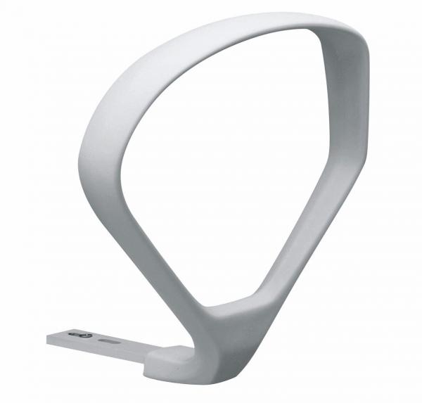 The image shows a sculptural, modern holder made of white plastic. It has a curved shape with a broad, slightly oval top part and a stable, flat base.