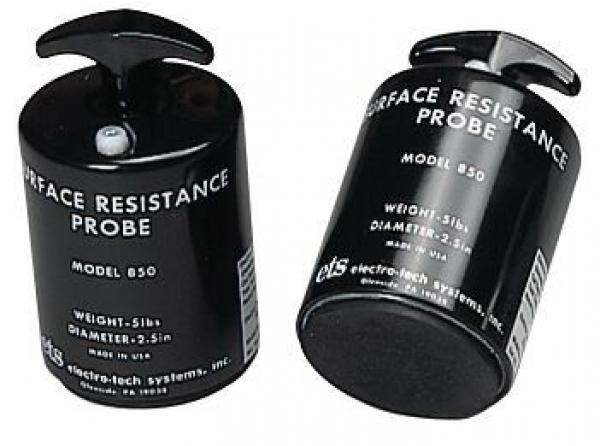 The image shows two black, cylindrical measuring devices with a flat bottom and a rounded top. On the surface are white inscriptions about the model and technical specifications.