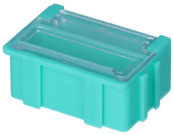 Die Abbildung zeigt eine kleine, rechteckige Box in einem hellen Türkis. Sie hat einen transparenten Deckel und ist aus robustem Kunststoff gefertigt. Die Seiten sind leicht strukturiert.