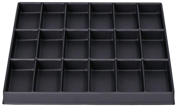 Das Bild zeigt eine schwarze, flache Kunststoffform mit 20 gleichmäßigen, rechteckigen Vertiefungen, angeordnet in einem Raster von 4 Reihen und 5 Spalten.