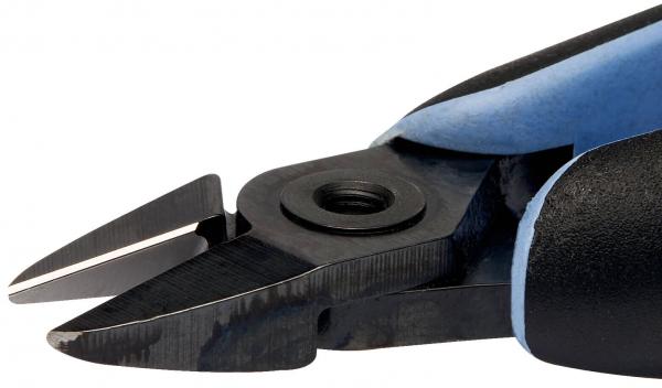 The image shows the end of a pair of pliers with two sharp blades. The handle is ergonomically shaped and made of black and blue material. The blades are slightly open.