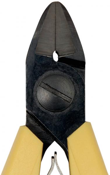 The image shows a pair of pliers with narrow, pointed jaws. The handles are beige and the blades are made of black metal. There is a circular indentation in the middle.