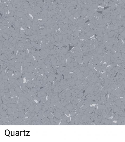 Das Bild zeigt eine strukturierte, graue Oberfläche mit kleinen, unregelmäßigen, helleren Einsprengseln. Darunter steht das Wort "Quartz". Die Farben sind dezent und harmonisch.