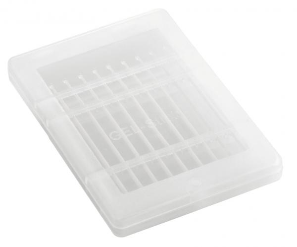 The image shows a transparent, rectangular container with a striped bottom. It has a flat shape and can be used for storing small items.