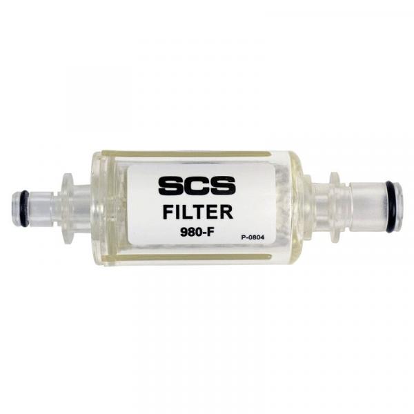The image displays a transparent filter with two connections. On the filter, the words "SCS FILTER" and the number "980-F" are written in large letters. The filter has a cylindrical shape.