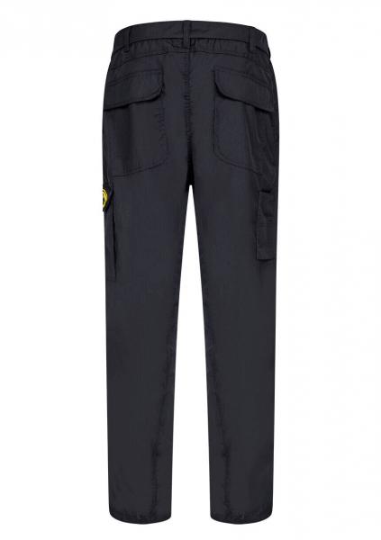 The image shows a black pair of pants with a slim fit. They feature side patch pockets and a small yellow logo plate. The fabric appears sturdy and smooth.