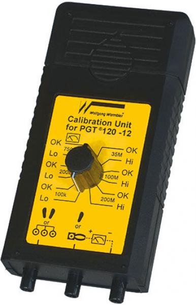 The image displays a black, rectangular device with a yellow front. It features a rotary knob in the center and several status indicators in the form of symbols and text, displaying calibration values.