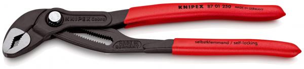 Die Zange hat rote, ergonomische Griffe und einen schwarzen Kopf. Sie verfügt über eine selbstsperrende Mechanik und Zahnflächen, um festen Grip zu bieten. Ideal für Handwerksarbeiten.