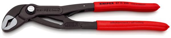 The image shows a black pipe wrench with red handles. It has an adjustable head with serrated jaws, ideal for gripping and turning pipes or nuts.
