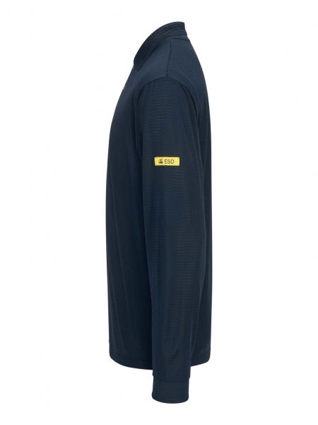 The image shows a long-sleeved, dark blue shirt. It has a high collar and there is a yellow label on one sleeve. The cut is sporty and simple.