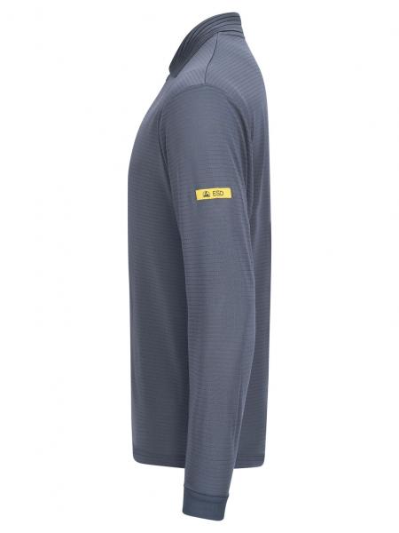 The image shows a long-sleeved, gray top. It has a stand-up collar and a simple, modern cut. There is a yellow logo on one sleeve.