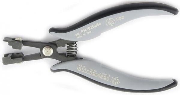 The image shows a pair of pliers with gray, rubberized handles and a spring mechanism in the middle. It has a black working area with a special opening for gripping.