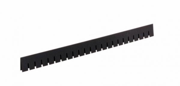 In the image, there is a black, elongated object that is flat with many evenly distributed, narrow slits. It could be some sort of stencil or separator tool.