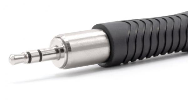 The image shows a silver 3.5 mm jack plug with a non-slip, black rubber coating. The plug has three contact strips and is slightly conical in shape.