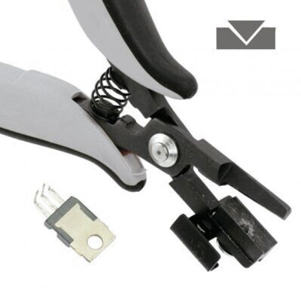 The image shows a black and gray pliers with a spring mechanism. Next to the pliers is a small, black clip. In the upper right, there's a simple symbol with a downward arrow.