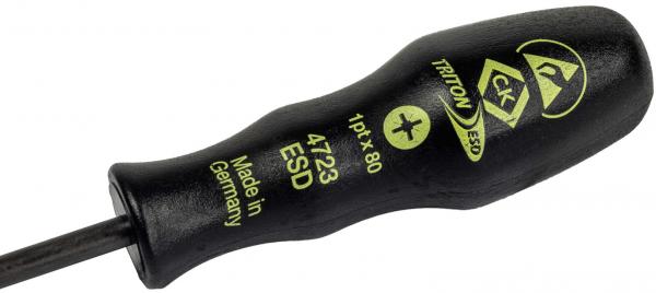 The image shows a black screwdriver with an ergonomic handle. The handle has yellow lettering with details on size and manufacturer. The blade is narrow and straight.