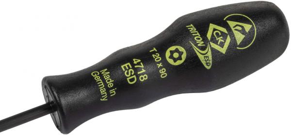 The image shows a black screwdriver with an ergonomic handle. The handle has green prints with a model number and the note "Made in Germany". The screwdriver has a long, thin blade.