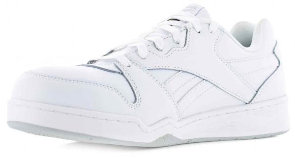 The shoe is a bright, white sneaker with a smooth surface. It has a round toe, flat laces, and a flexible rubber sole. The sides feature subtle stitching and markings.