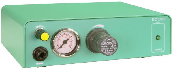The image shows a green device with a rectangular casing. On the front, there is a pressure gauge, a rotary control, and three buttons. It is labeled with "DC 150" and "POWER".