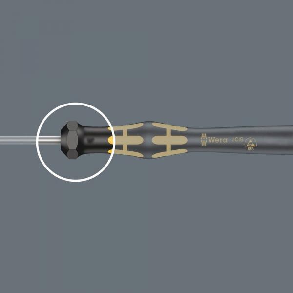 The image shows a black screwdriver with yellow accents. The handle has an ergonomic shape, while the blade is straight and thin. There is a symbol on the top of the handle.