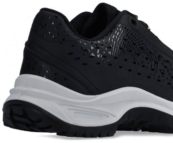 The image shows a black shoe with a modern design. The surface has a textured, glossy texture with triangular patterns. The sole is white and treaded.
