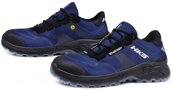 The image shows a pair of athletic shoes. They are primarily dark blue with black accents. The shoelaces are black, and there is a yellow detail on the side.