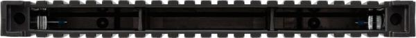 The image shows an elongated, black object with a ridged upper edge and two open compartments in the middle. The structure is sturdy and monochrome.